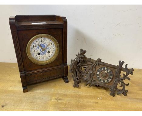 A 1920's / 30's mantel clock with galleried top above circular dial, with blue and white decoration, on bracket feet, measure