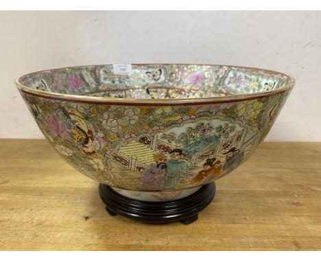 A Chinese bowl in famille rose pattern, figures before noble to bottom of well, with image repeating twice to sides, red seal