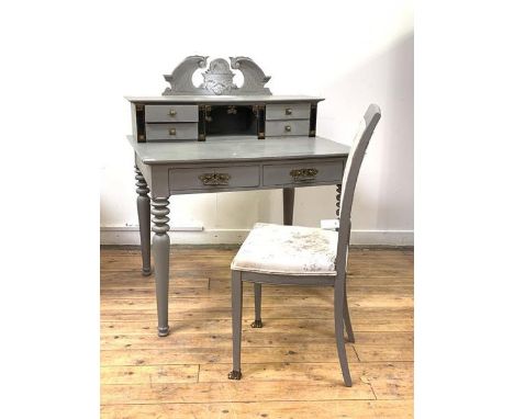 A Late Victorian grey painted writing desk, the later raised pediment above a super structure fitted with four trinket drawer