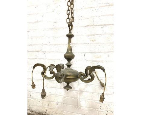 A quality early 20th century cast brass ceiling pendent light fitting, four leaf cast 'S' scroll branches issuing from a balu
