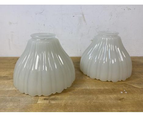 An early 20thc opaque glass hanging light shade with ribbed and scalloped edge, measures 11.5cm high x 14.5cm diameter at bas
