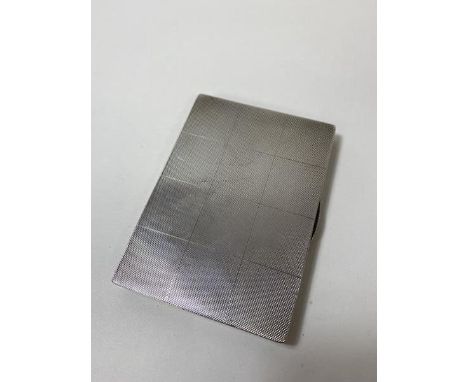 A 1940's Birmingham silver cigarette case with engine turned exterior and interior, inscribed Presented to Mrs Winkler, the f