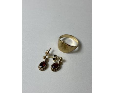 A pair of pendant earrings, marked 9ct, and a yellow metal signet style ring, size K/L