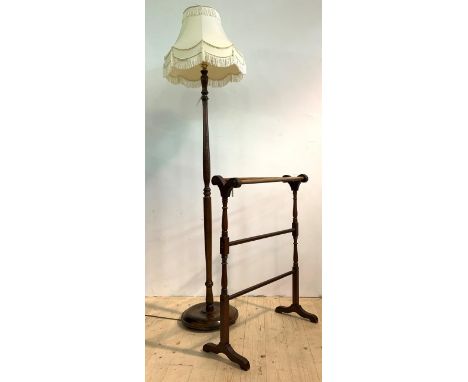 A 20th century standard light, the turned column on a circular base, with a decorative tasseled shade, (H182cm) together with