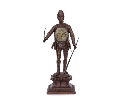 PENDULE FIGURATIVE EN BOIS FRUITIER, MOUVEMENT A SONNERIE, TRAVAIL AUTRICHIEN An Austrian carved fruitwood figural clock with