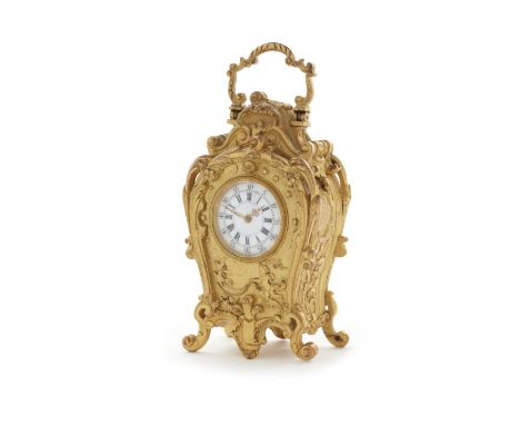 PENDULE ROCOCO MINIATURE DOREE FRANCAISE DU TROISIEME QUART DU 19EME SIECLE A third quarter of the 19th century French Gilt m