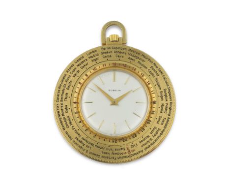 GUBELIN. PENDULETTE DE BUREAU EN PLAQUE OR AVEC FUSEAUX HORAIRES REMONTAGE MANUEL GUBELIN. A GOLD PLATED MANUAL WIND OPEN FAC