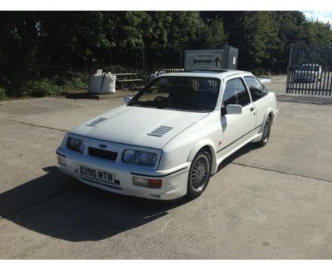 A 1987 Ford Sierra RS Cosworth, registration number D290 WTN, white. In the mid 1980s Ford resumed their affiliation with Cos