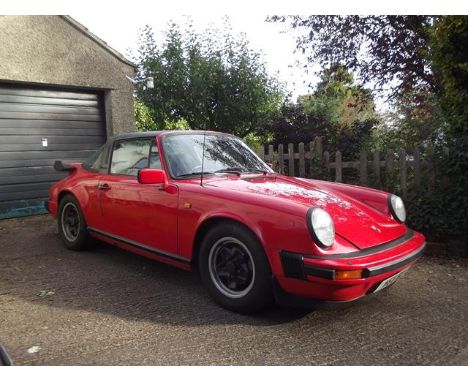 A 1982 Porsche 911SC Targa, registration number WSV 911, Guards red. In 1978 Porsche introduced its new version of the venera