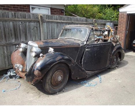 A 1939 Sunbeam Talbot 10 drophead coupé restoration project, black. This Sunbeam Talbot 10 drophead coupé is known to the own
