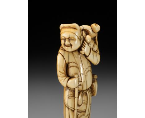 A GOOD TALL IVORY NETSUKE OF A SARUMAWASHI (MONKEY TRAINER)UnsignedJapan, 18th century, Edo period (1615-1868)Superbly carved