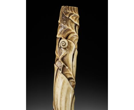 A FINE ANTLER KISERUZUTSU WITH BASHO LEAVES AND SNAILUnsignedJapan, Tokyo, Asakusa district, second half of the 19th centuryT
