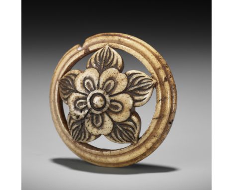 KOKUSAI: A FINE ANTLER RYUSA MANJU NETSUKE WITH PRUNUS BLOSSOMBy Ozaki Kokusai (1835-1892), sealed Koku 谷Japan, Shiba, Tokyo,