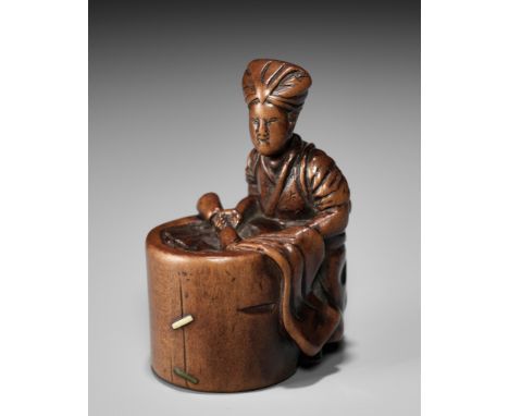 A BOXWOOD NETSUKE OF WASHERWOMANBy Hakusen, signed Hakusen 白仙 Japan, Edo (Tokyo), c. 1800, Edo period (1615-1868)The woman sl