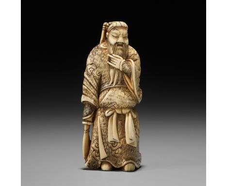 A POWERFUL IVORY NETSUKE OF KAN'UUnsignedJapan, 18th century, Edo period (1615-1868)The ivory netsuke of triangular sankaku t