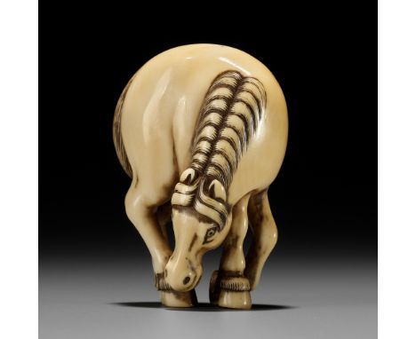 A FINE IVORY NETSUKE DEPICTING A GRAZING HORSEUnsignedJapan, first half of 19th century, Edo period (1615-1868)Finely carved 