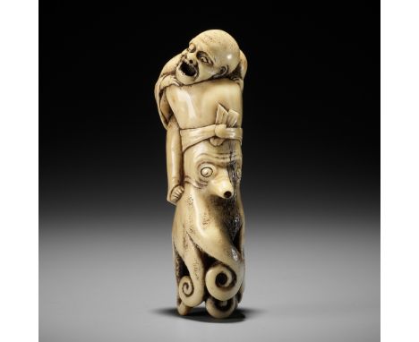 A SUPERB ANTLER NETSUKE OF A BLIND MAN AND OCTOPUSUnsignedJapan, 19th century, Edo period (1615-1868)Published: Katchen, Arle