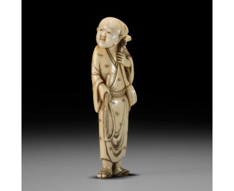 A RARE TALL IVORY NETSUKE OF A KOKYU PLAYERUnsignedJapan, Osaka, 18th century, Edo period (1615-1868)The musician holding the