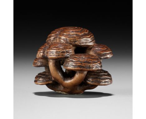 A WOOD NETSUKE OF REISHI FUNGIUnsignedJapan, 19th century, Edo period (1615-1868)Finely carved as a cluster of reishi consist