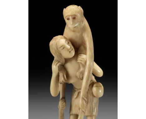 KAIGYOKUSAI: A FINE IVORY NETSUKE OF A FISHER GIRL (AMA) WITH TENAGA MONKEYSSchool of Kaigyokusai Masatsugu (1813-1892), sign