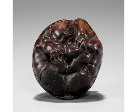 MASAKAZU: A NAGOYA SCHOOL WOOD NETSUKE OF A COWERING ONI DURING SETSUBUNBy Masakazu, signed Masakazu 正一Japan, Nagoya, first h