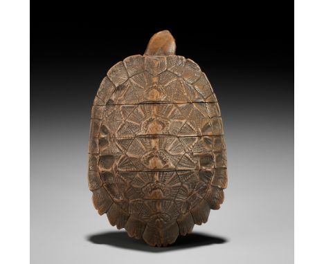 A FINE THREE-CASE WOOD INRO OF A TORTOISEUnsignedJapan, 19th century, Edo period (1615-1868)Naturalistically carved as a tort