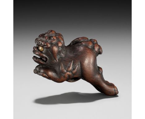 MASAHIDE: AN AMUSING TANBA SCHOOL WOOD NETSUKE OF A RUNNING SHISHIBy Masahide, signed Masahide 正秀Japan, Tanba province, mid-1