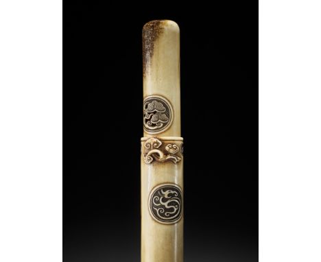 KOKUSAI: A SUPERB ANTLER KISERUZUTSU WITH MON-CRESTS AND SHOCHIKUBAIBy Ozaki Kokusai (1835-1892), sealed Kokusai 谷齋Japan, Shi