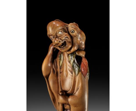 A SUPERB AND LARGE OSAKA SCHOOL INLAID WOOD NETSUKE OF GAMA SENNIN, ATTRIBUTED TO KOKEISAI SANSHOAttributed to Kokeisai Sansh