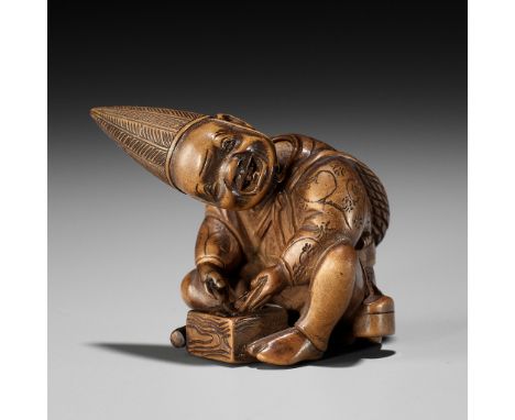 MASAYOSHI: AN AMUSING WOOD NETSUKE OF A PARASOL MAKER WITH A MOVABLE HEADBy Masayoshi, signed Masayoshi 正義Japan, Nagoya, 19th