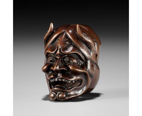 A FINE WOOD NETSUKE OF OKAME AND HANNYA MASKSUnsignedJapan, Edo (Tokyo), mid-19th century, Edo period (1615-1868)Published: B
