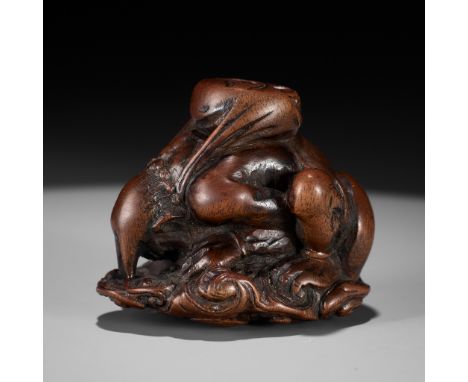 ITTAN: A FINE WOOD NETSUKE OF RAIJIN PEERING THROUGH CLOUDSBy Ittan, signed Ittan 一旦 with kakihanJapan, Nagoya, c. 1850, Edo 
