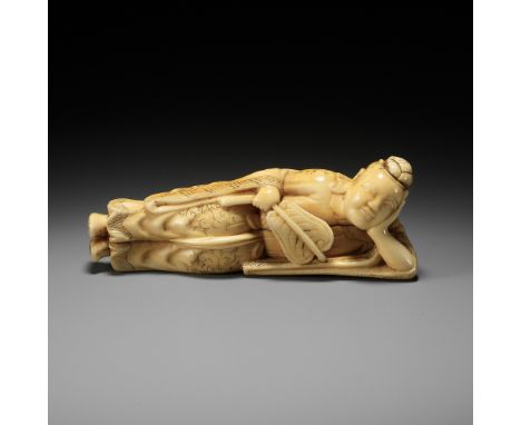 A GOOD IVORY NETSUKE OF ROSEI'S DREAMUnsignedJapan, early 18th century, Edo period (1615-1868)Rosei is depicted as a reclinin