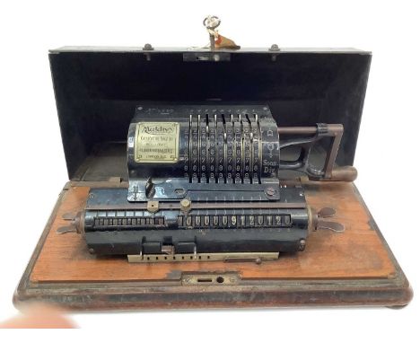 Vintage Muldivo calculating machine in original fitted case