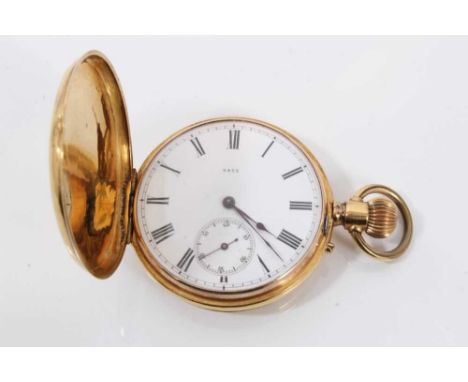 Gold (stamped K.18) full hunter pocket watch with white enamel dial numbered 2852, Roman numeral markers and subsidiary secon