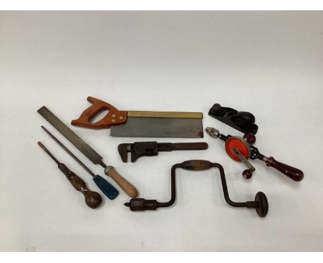 Group of tools, including files, brace, saw, etc