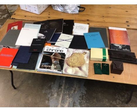 Large quantity of watchmaker's and retailer's magazines and catalogues, together with Rolex and Patek Phillippe boxes and cas