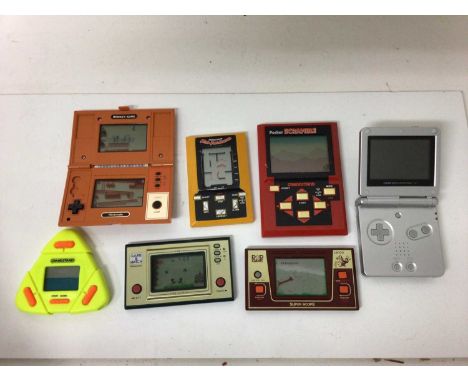 Vintage Nintendo games including Game and Watch Donkey Kong and Fire, Pocket Scramble, Mini-Munchman , Game Boy Advance SP, P