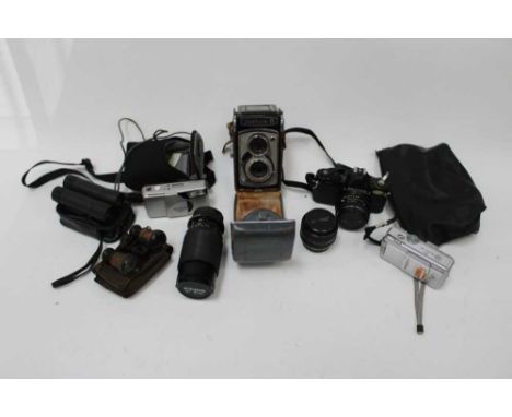 Yashica B twin lens reflex camera in case, together with a Pentax MV and lens, and other cameras and accessories