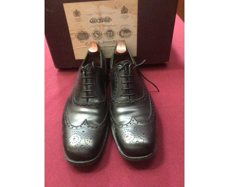 A pair of Vintage John Lobb Black Leather 'Brogue' Shoes in original box.Condition report: Pre-owned. Shoes in good condition