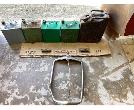 Five vintage petrol cans, and a Morris 8 radiator grille 