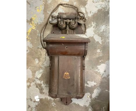 Vintage wall-mounted 'National Telephone Service' telephone with bell