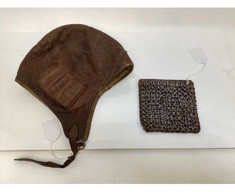 Vintage Brown leather flying / motorcycle helmet, with press studs stamped- made in Czechoslovakia, together with a chain mai