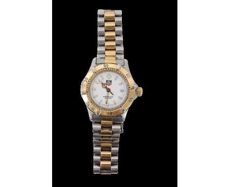 Ladies Tag Heuer Professional bi-metal wristwatch with a circular white dial, applied luminous hour markers and hands, date a