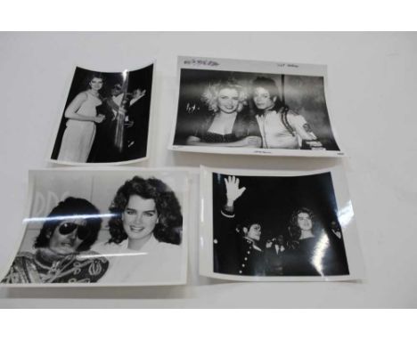 Michael Jackson Twelve 1980's Black and White Press Release photographs. Michael Jackson with various stars including Liz Tay