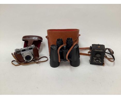 Miscellaneous group of items to include a Voigtländer camera, a Retina camera, binoculars, vintage slide viewer with photogra