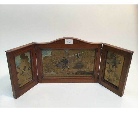 First World War period engraved brass triptych panels in folding mahogany frame of Royal Flying Corps aircraft, central panel