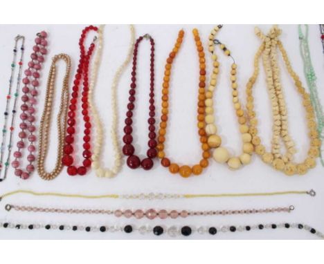 Group vintage bead necklaces including faceted glass, ivory and a reconstituted amber necklace with graduated spherical beads