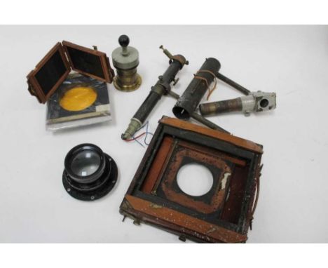 Photography interest: plate camera parts, wooden slides, developing tank, lenses, etcCondition report: Brass lens measures 10