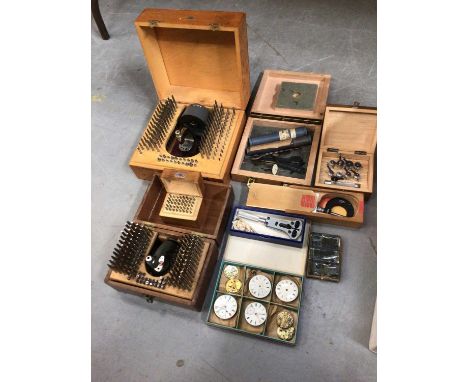 Extensive collection of watch makers' equipment to include a lathe, watch glasses, balance springs, punches, micrometers, vin